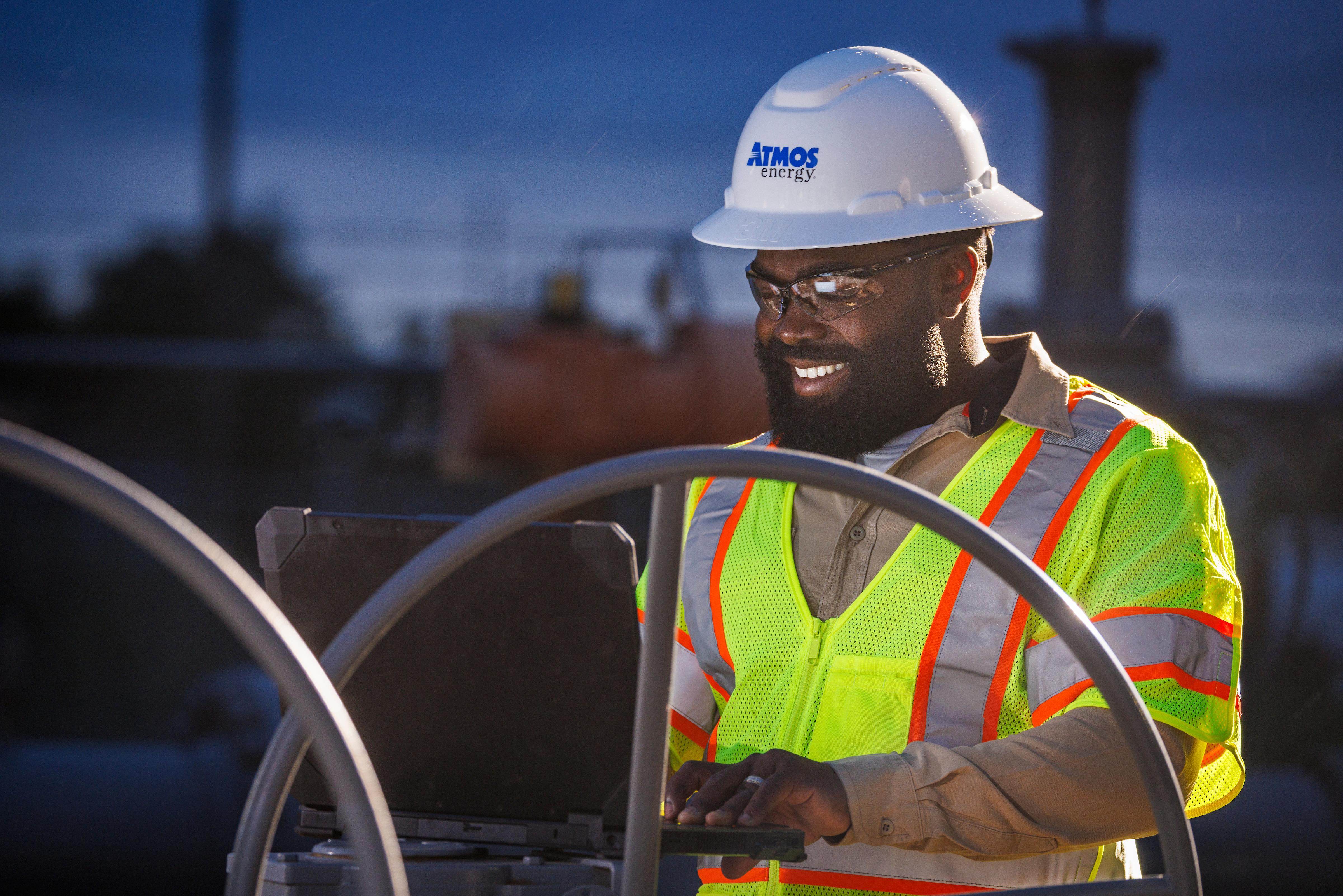 Man wearing a hard hat and safety vest